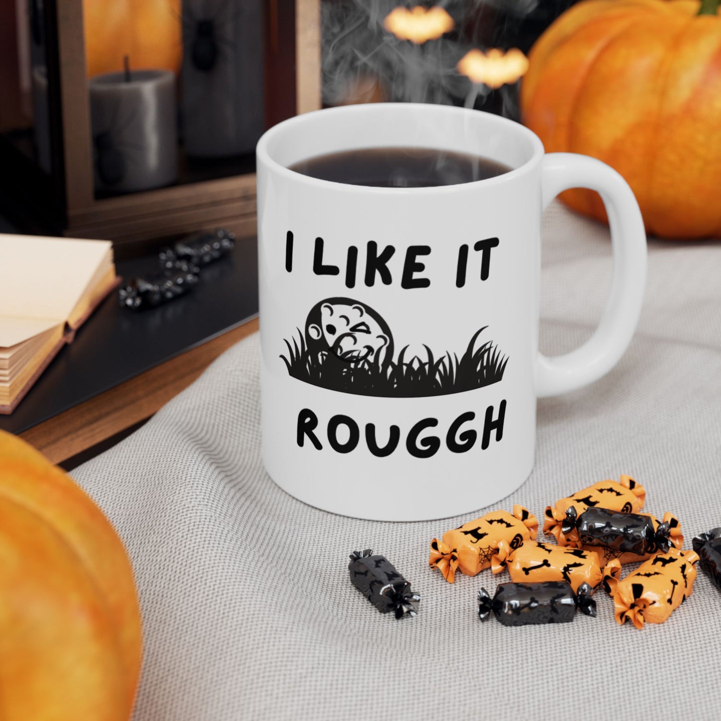 Coffee Mug surrounded by Halloween Candy