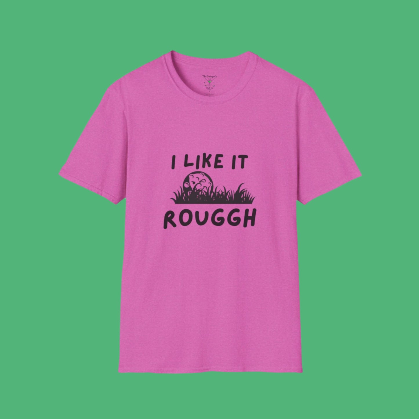 Pink t-shirt with 'I LIKE IT ROUGGH' text on it with a golf ball in the rough with a green background