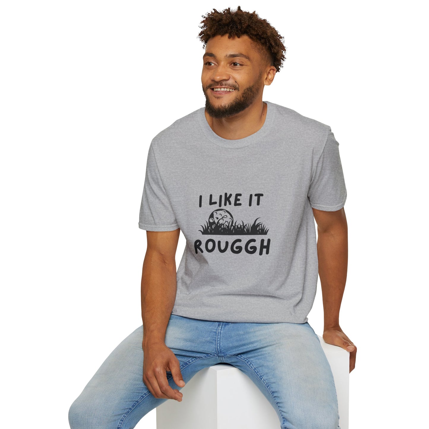 Man wearing a gray t-shirt with text sitting on a white stool against a white background