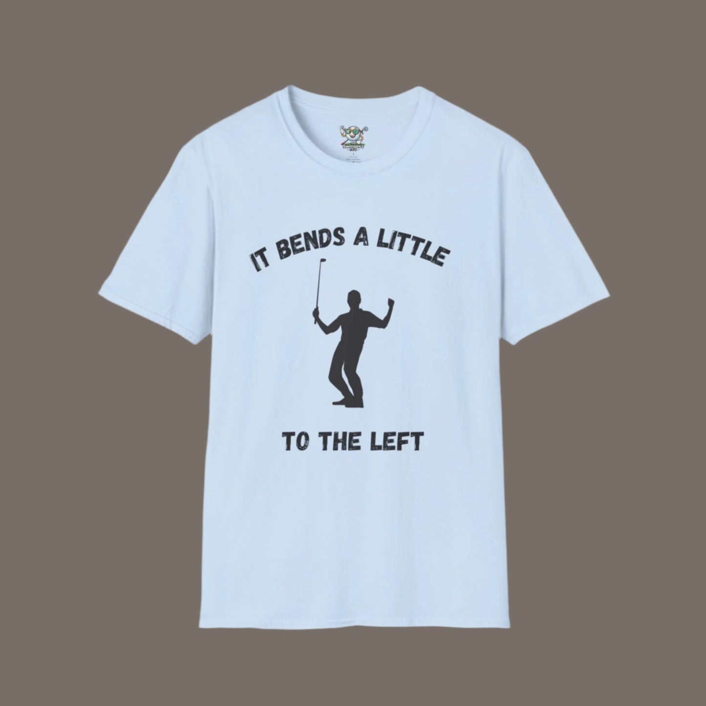 Light Blue Shirt with golfer celebrating with a text saying "It bends a Little" above and "To the left" at the bottom of the design with a dark gray background