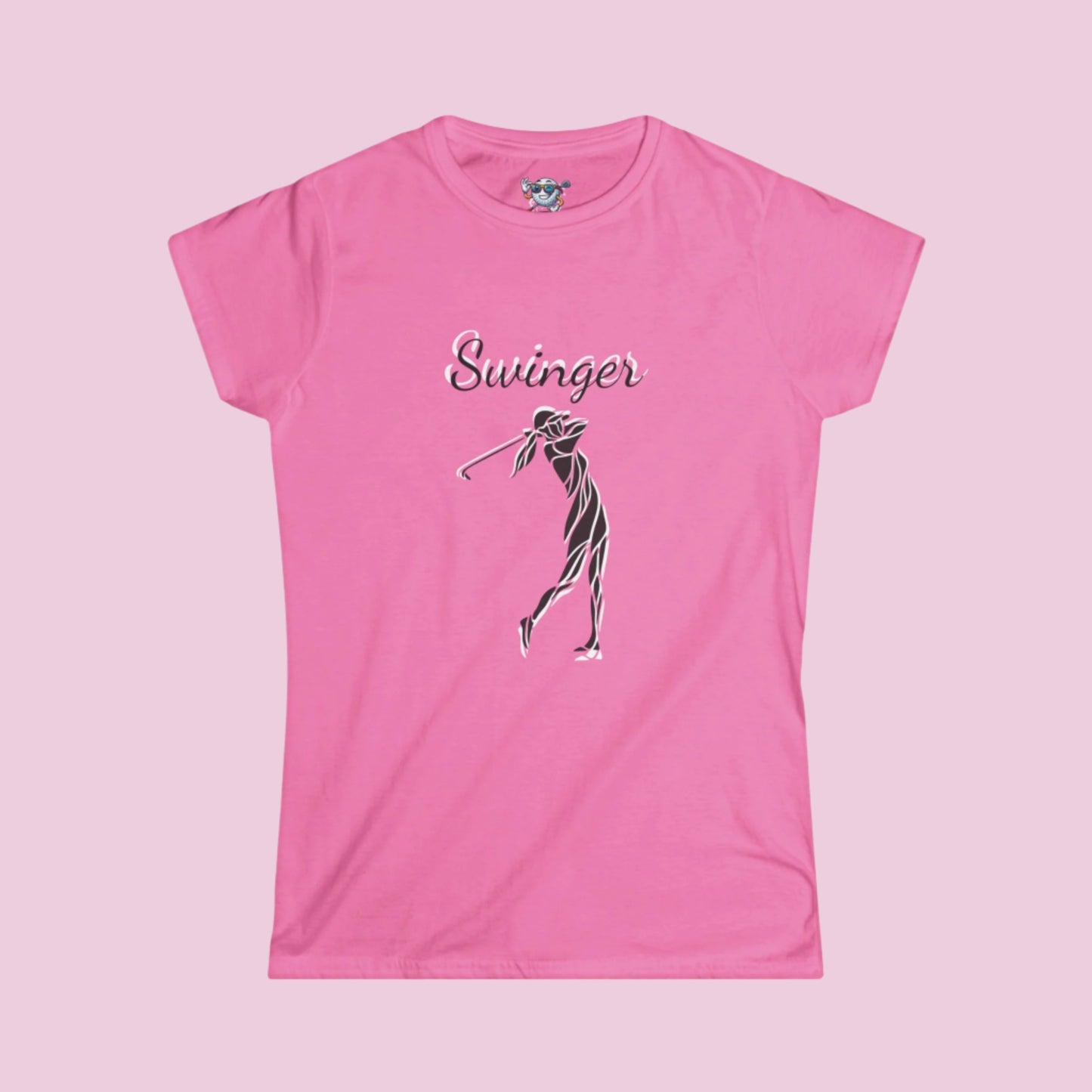 Pink Golf shirt with a design of a Female Golfer at the finish of her swing with the text Swinger over the design with a light pink background