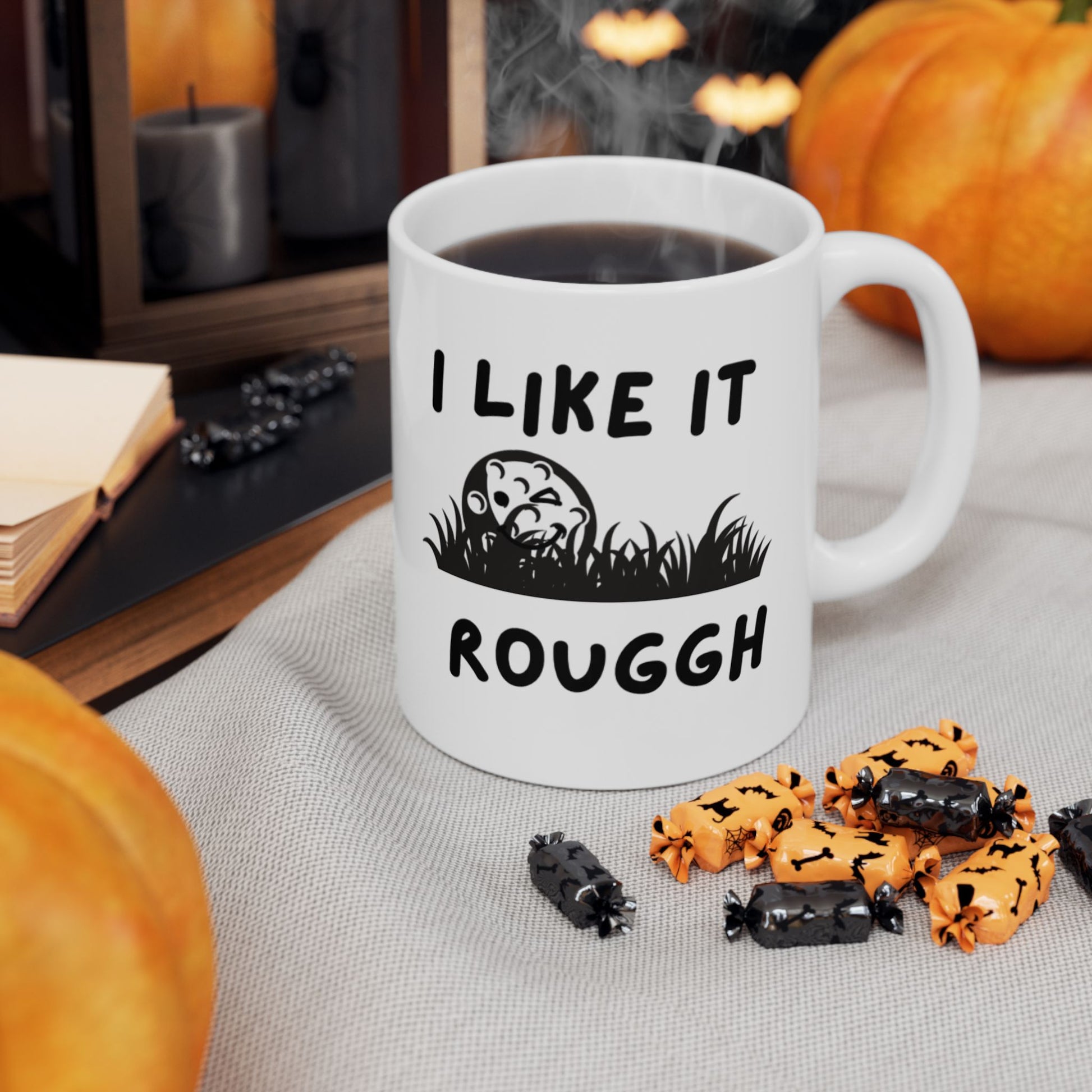 Coffee Mug surrounded by Halloween Candy
